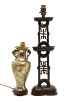 Lot 310 - A Japanese silvered lamp base of urn form