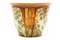 Lot 519 - An Art Nouveau pottery jardiniere