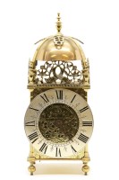 Lot 319 - A brass lantern clock reproduction