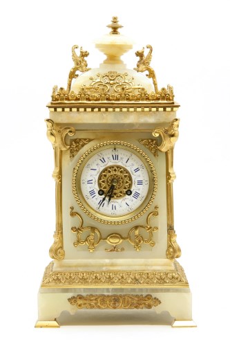 Lot 361 - An alabaster and gilt mounted mantle clock