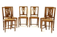 Lot 661 - A set of six mahogany dining chairs