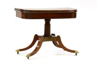 Lot 668 - A George III inlaid mahogany fold over card table