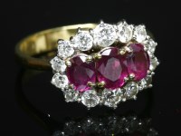 Lot 270 - An 18ct gold ruby and diamond cluster ring