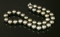 Lot 348 - A single row uniform Tahitian cultured pearl necklace