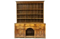 Lot 583 - A George III oak dresser