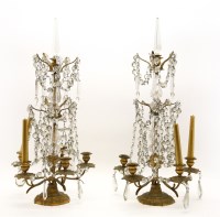 Lot 356 - A pair of brassed metal candelabra