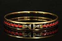 Lot 516 - An Hermès narrow enamel bangle with gold-plated guards