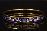 Lot 515 - An Hermès narrow enamel bangle with gold-plated hardware