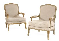 Lot 807 - A pair of French limed oak open elbow chairs