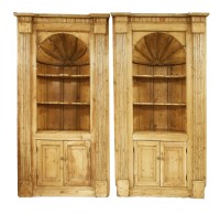 Lot 854 - A pair of George III pine barrel-backed corner cupboards or alcoves