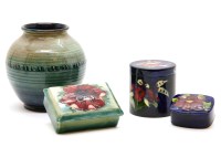 Lot 160 - Three Moorcroft pots and covers