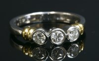 Lot 397 - A three stone diamond ring