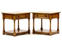 Lot 515 - A pair of oak bedside tables with drawers