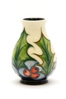 Lot 116 - A Moorcroft 'Holly' vase