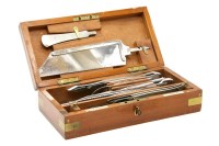 Lot 118 - A doctor's saw and knife set
