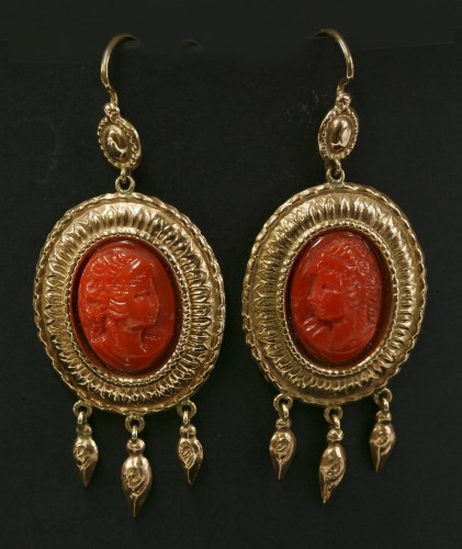 Lot 187 - A pair of Italian gold and carved coral cameo drop earrings