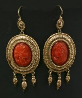 Lot 187 - A pair of Italian gold and carved coral cameo drop earrings
