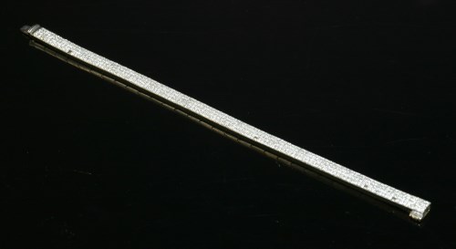 Lot 402 - A white gold diamond set bracelet with square links
