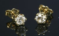 Lot 324 - A pair of 18ct gold single stone diamond stud earrings