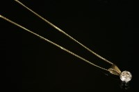 Lot 581 - A 9ct gold single stone diamond pendant