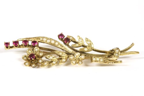 Lot 8 - A gold seed pearl and ruby spray brooch