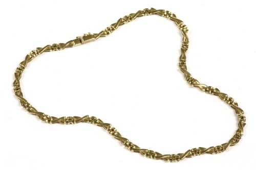 Lot 40 - A 9ct gold panther and cross link chain necklace