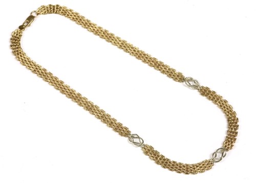 Lot 31 - A 9ct two colour gold fancy link necklace
