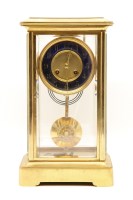 Lot 189 - A 19th century French brass four glass mantel clock
