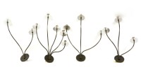 Lot 326 - A set of four brushed aluminium and brass wall lights