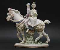 Lot 223 - A Lladro porcelain figural group of a Valencian couple on horse back