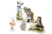 Lot 264 - A 20th century 'unter weiss bach' porcelain figural group of a couple seated