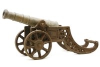Lot 217 - A brass and iron cannon