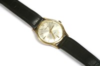 Lot 49 - A cased gentlemen's 9ct gold Garrard Automatic strap watch