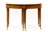 Lot 494 - A pair of George III mahogany dining table 'D' ends