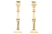 Lot 106A - A pair of Indian ivory candlesticks