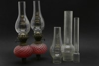 Lot 89 - A pair of Victorian candlestick oil lamps