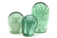 Lot 231 - Three Victorian green glass 'dump' weights