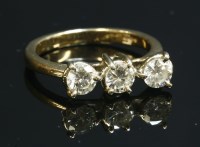 Lot 316 - A 9ct gold three stone diamond ring