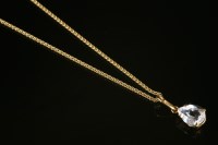 Lot 568 - An 18ct gold single stone aquamarine pendant