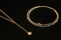 Lot 571 - An Italian gold belcher and star 'Y' pendant
