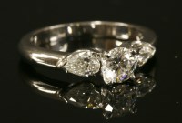 Lot 389 - A platinum single stone diamond ring
with diamond set shoulders