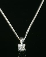 Lot 399 - An 18ct white gold single stone princess cut diamond pendant