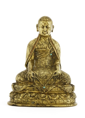 Lot 244 - A Chinese Tibetan bronze figure