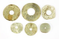 Lot 173 - A group of Chinese jade bi disc