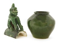 Lot 572 - A Chinese green-glazed jar