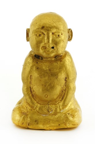 Lot 262 - A gold figure