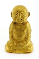Lot 262 - A gold figure