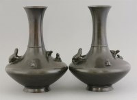 Lot 256 - A pair of bronze vases