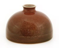 Lot 141 - A Chinese peach bloom glazed water-pot