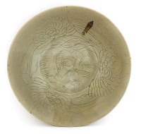 Lot 121 - A Chinese Swatow ware celadon charger